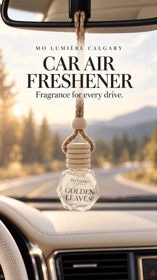 Golden Leaves car air freshener hanging inside a car