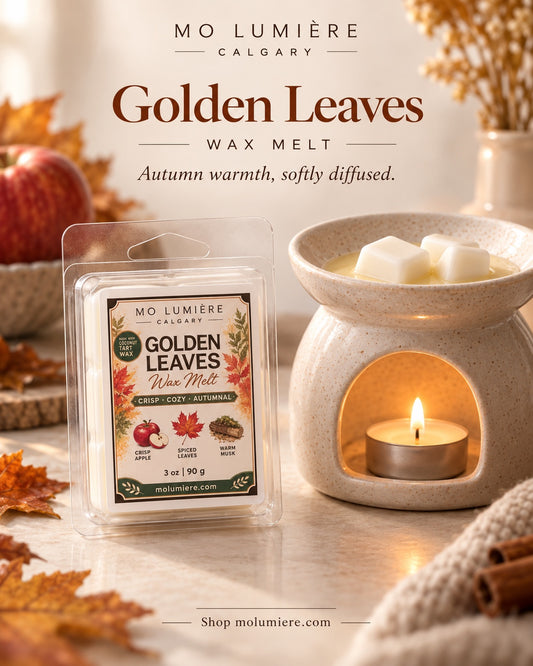 Mo Lumière Golden Leaves wax melt beside a ceramic wax warmer