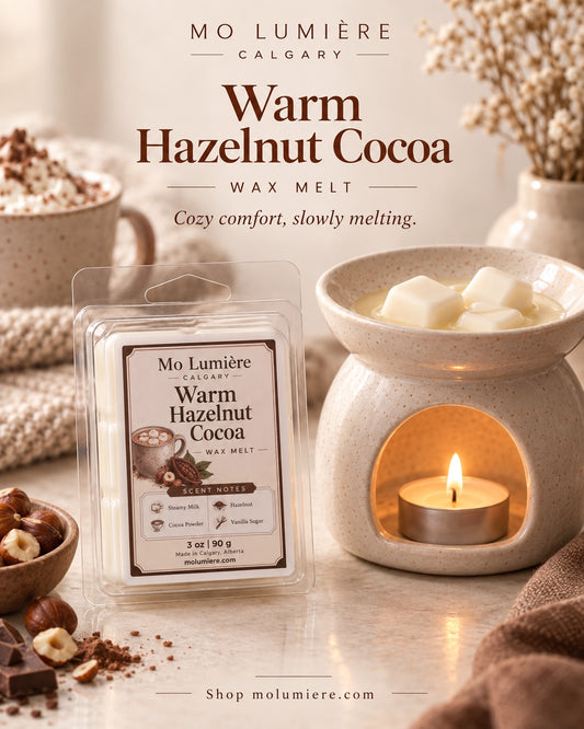 Mo Lumière Warm Hazelnut Cocoa wax melt beside a ceramic wax warmer